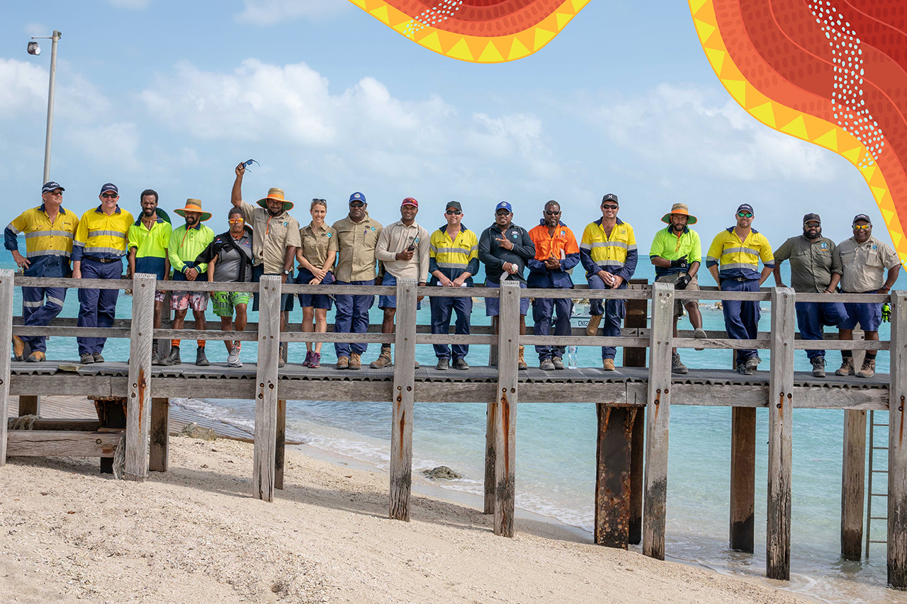 a group of seafarers / Torres Strait including indigenous artwork in the top righthand corner