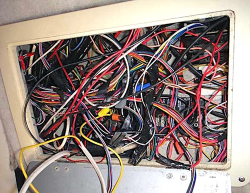 An example of a very poorly installed electrical wiring installation