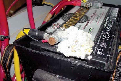 a poorly maintained battery which has a substance that looks likewhite power is lead sulphate which is toxic to ingest and breathe