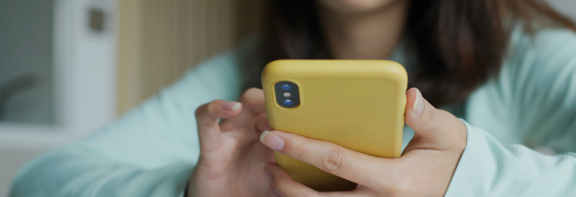 Close up image of a person using their mobile phone