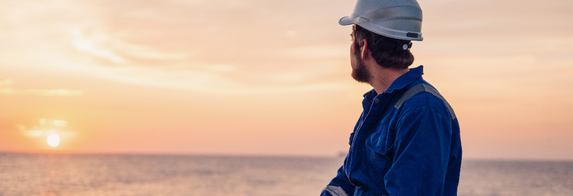 Seafarer looking out to sea