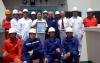 The Captain and crew of MV Xinfa Hai with AMSA Surveyor Greg Collinson, Newcastle