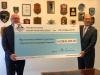 Image of Hon. George Brandis QC and the Secretary General of the IMO, Mr Kitack with donation for IMO Integrated Technical Cooperation Programme